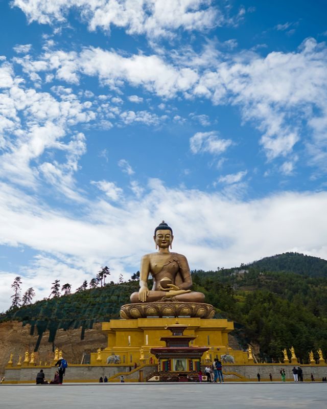 The Buddha Dordenma statue in Thimphu seen against an open sky