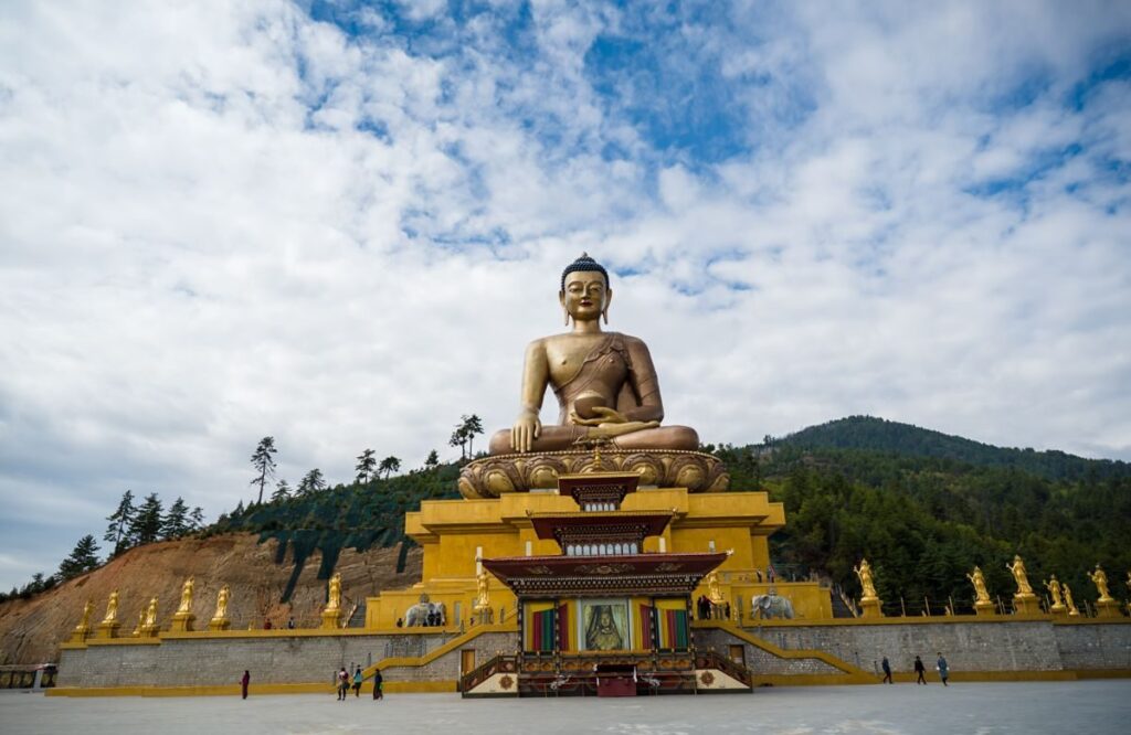 The gilded Buddha Dordenma statue above Thimphu, seen from the terrace below
