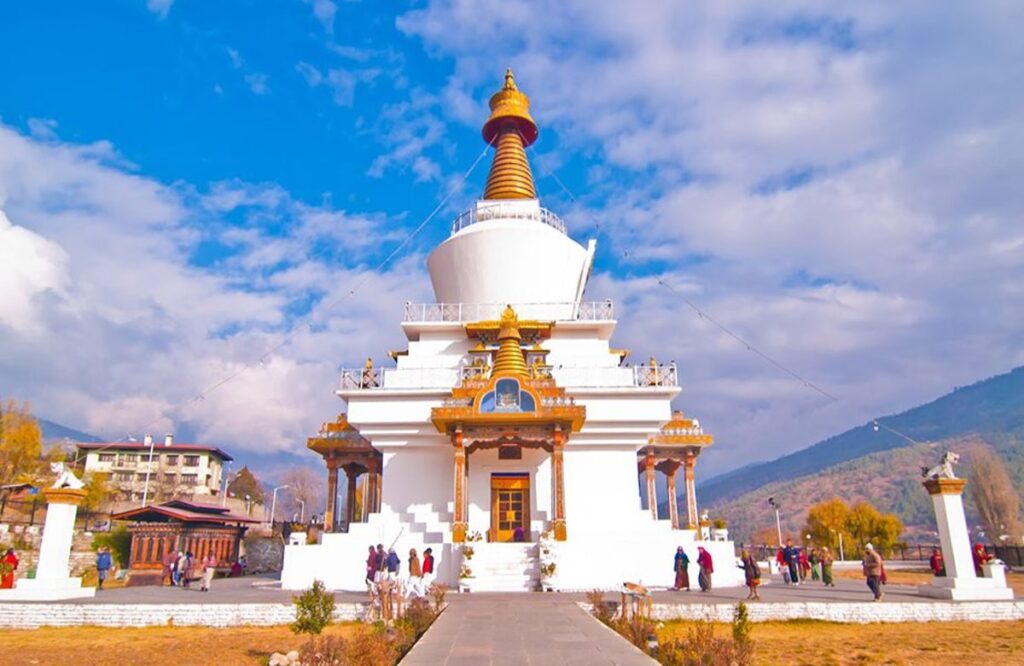 The Memorial Chorten in Thimphu, white with a golden spire, under a clear sky
